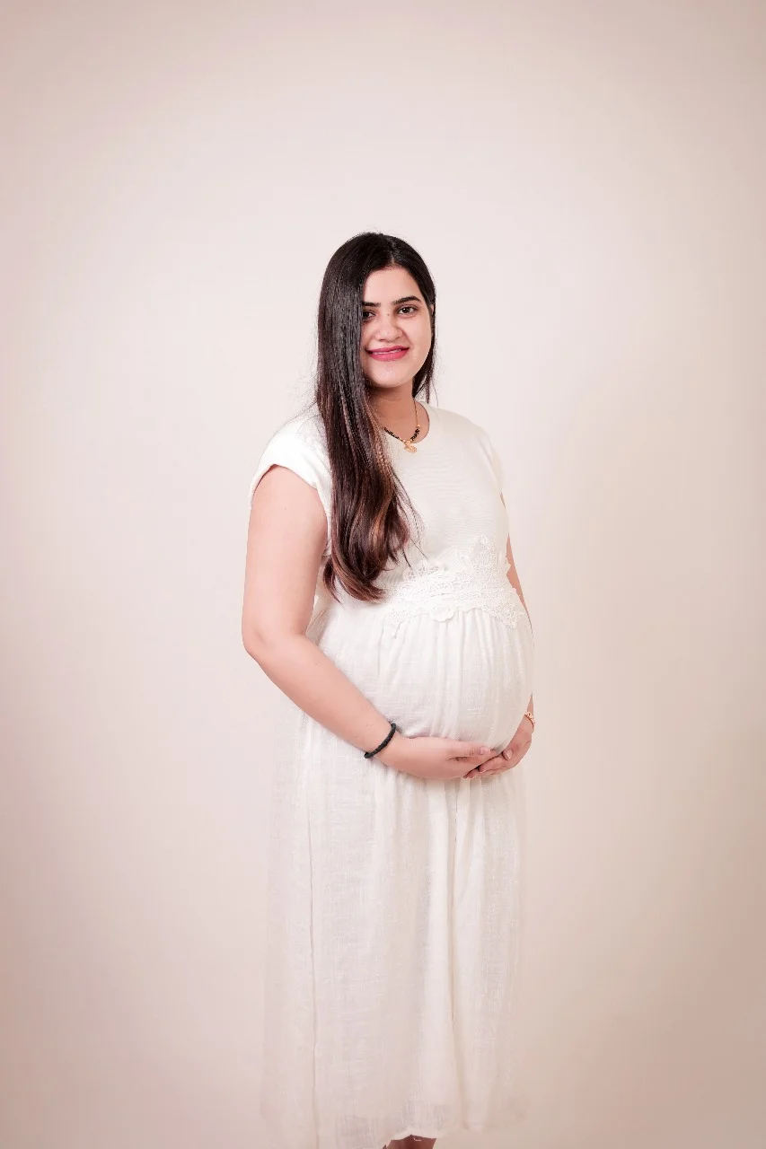 maternity shoot in white gown