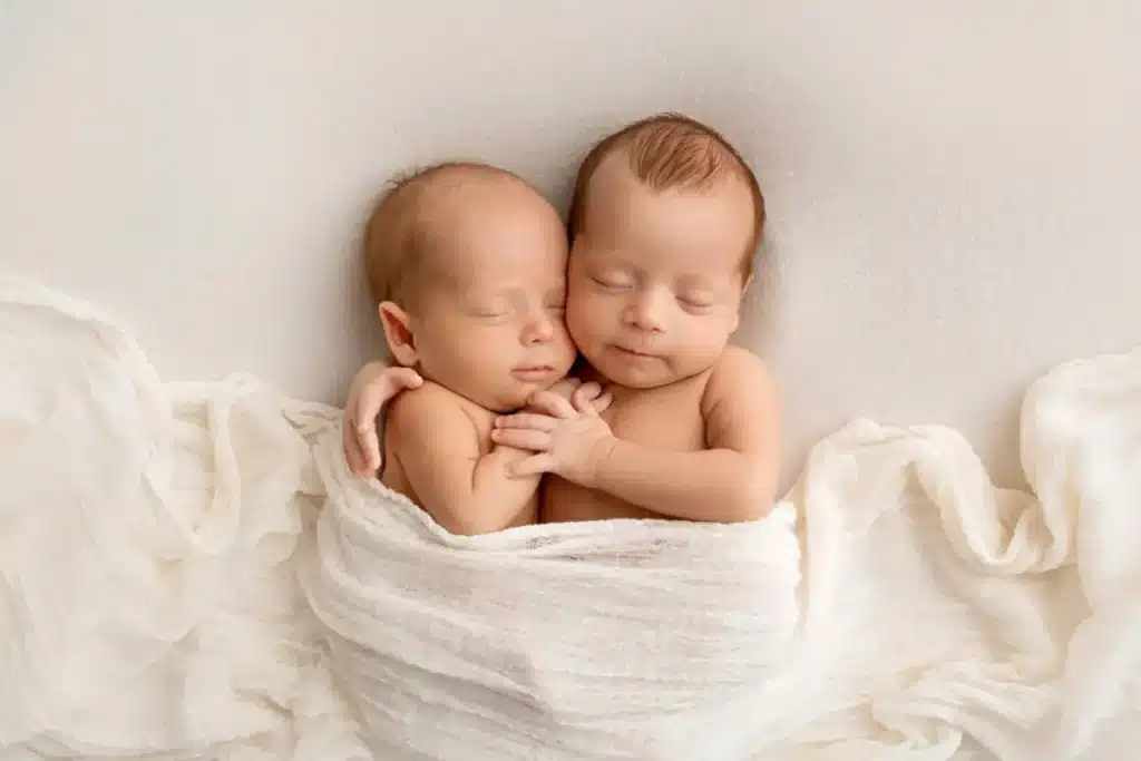 first hug of twins babies