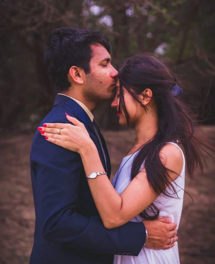 The Forehead Kiss pose for couple pre wedding shoot