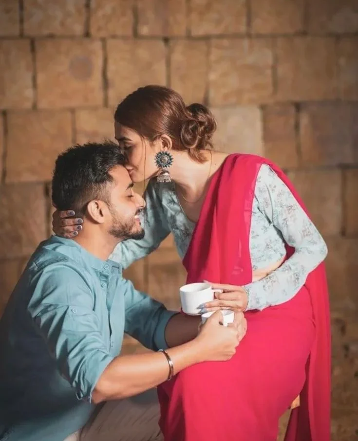 The Forehead Kiss pose for couple shoot